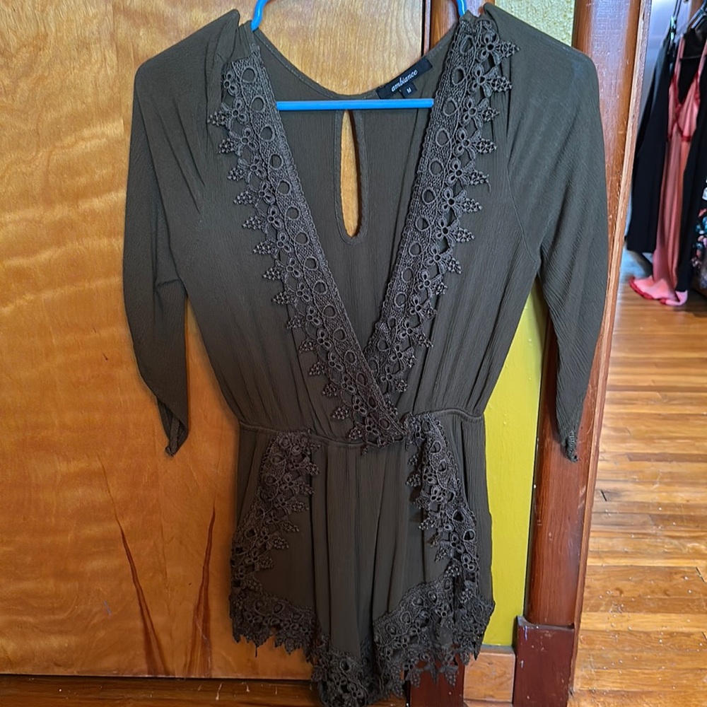 A dark green romper